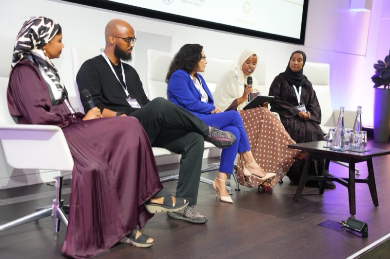 A panel discussion on stage at ESMC 2026